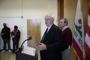 Richmond Mayor Tom Butt speaks during a press conference Friday at the Hacienda public housing complex in Richmond, Calif. Residents will be moved out within six months, officials promised.